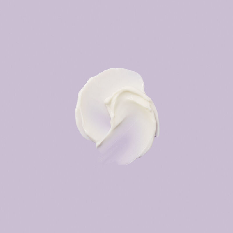 Rub of TimeWise Repair Volu-Firm Deep Wrinkle FIller cream on lavender background