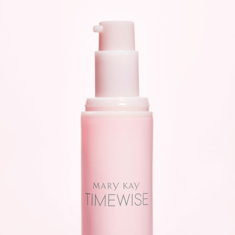 Zoomed in side view of uncapped bottle dispenser of TimeWise Replenishing Serum C+E