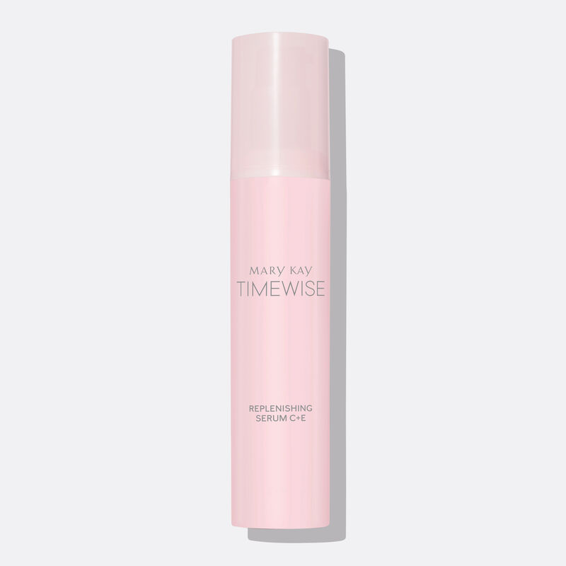 Light pink bottle of TimeWise Replenishing Serum C+E on plain background