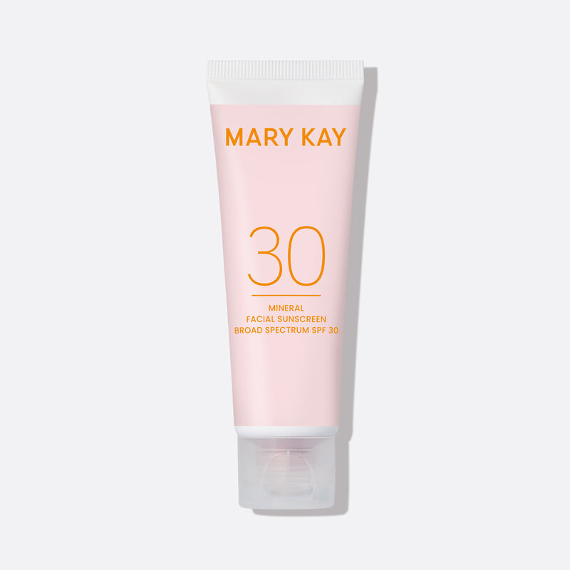 Pink tube of Mineral Facial Sunscreen SPF 30 on plain background
