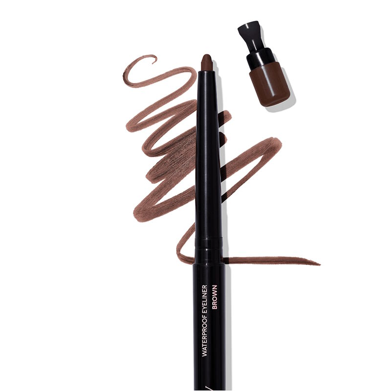 Uncapped Mary Kay Waterproof Eyeliner in Brown with squiggle product swatch behind it on plain background