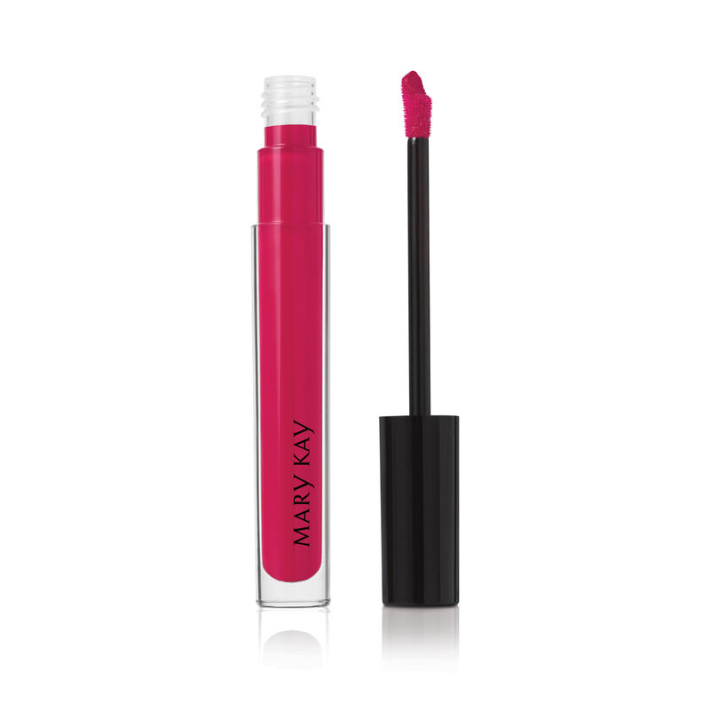Open tube of Mary Kay Unlimited Lip Gloss in shade Pink Fusion with accompanying applicator.