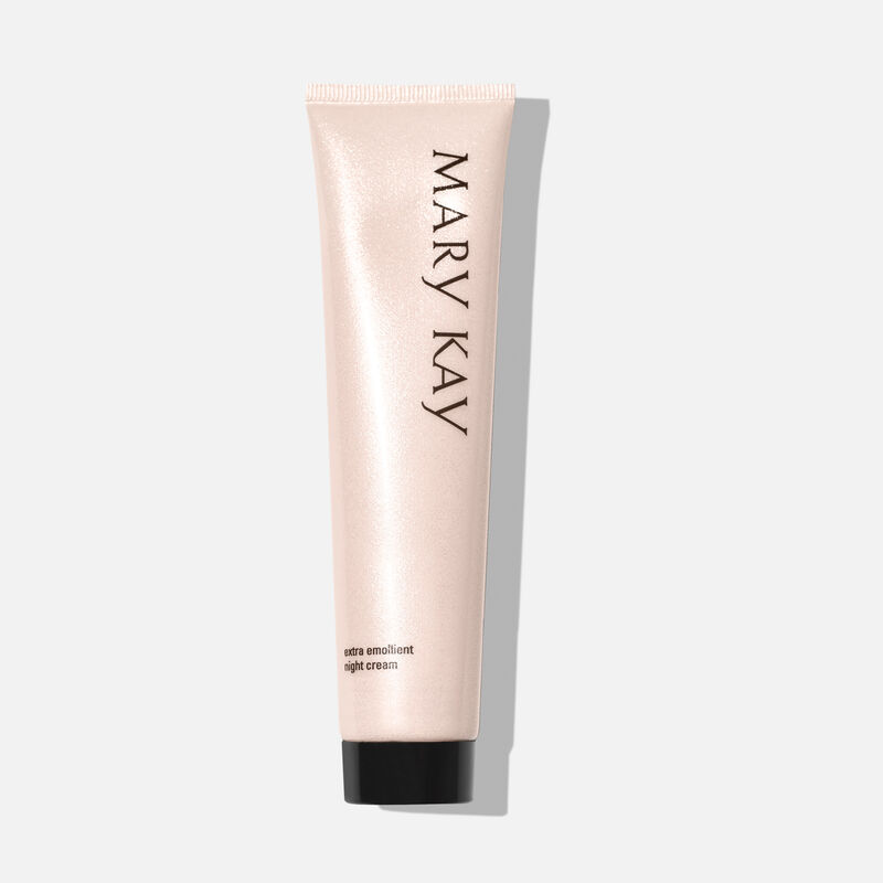 Tube of Mary Kay Extra Emollient Night Cream standing on its cap.