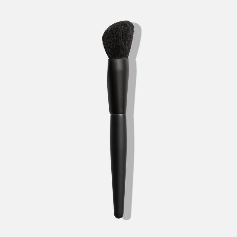 Mary Kay Cheek Brush on plain background