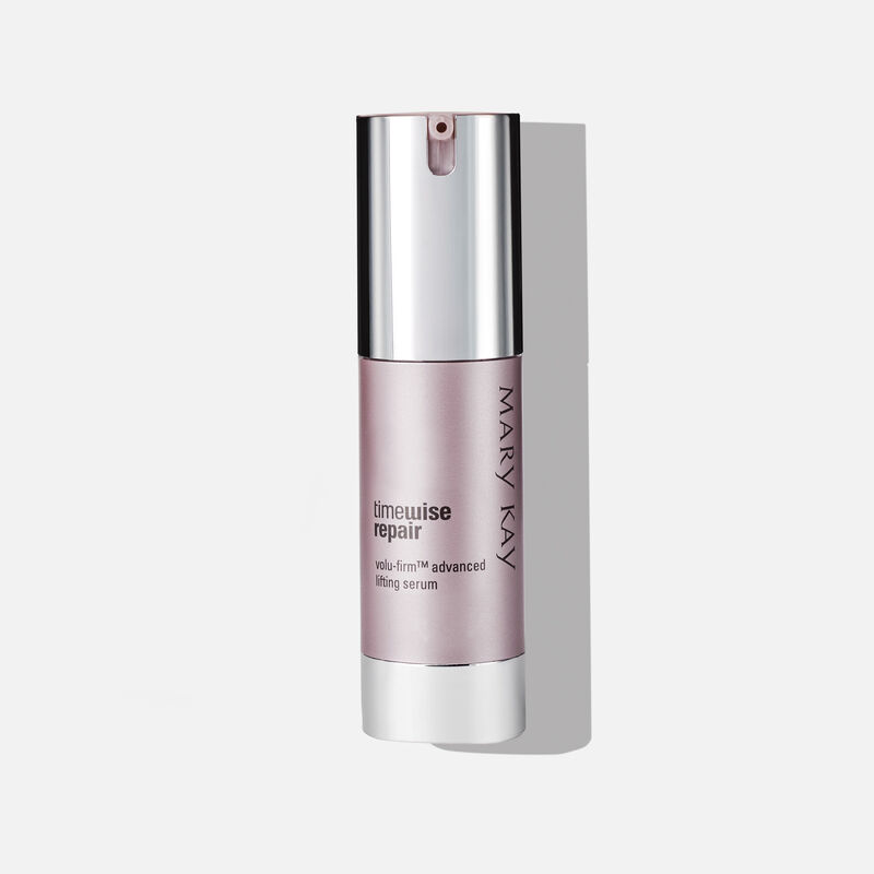 Bottle of TimeWise Repair Volu-Firm Advanced Lifting Serum on plain background