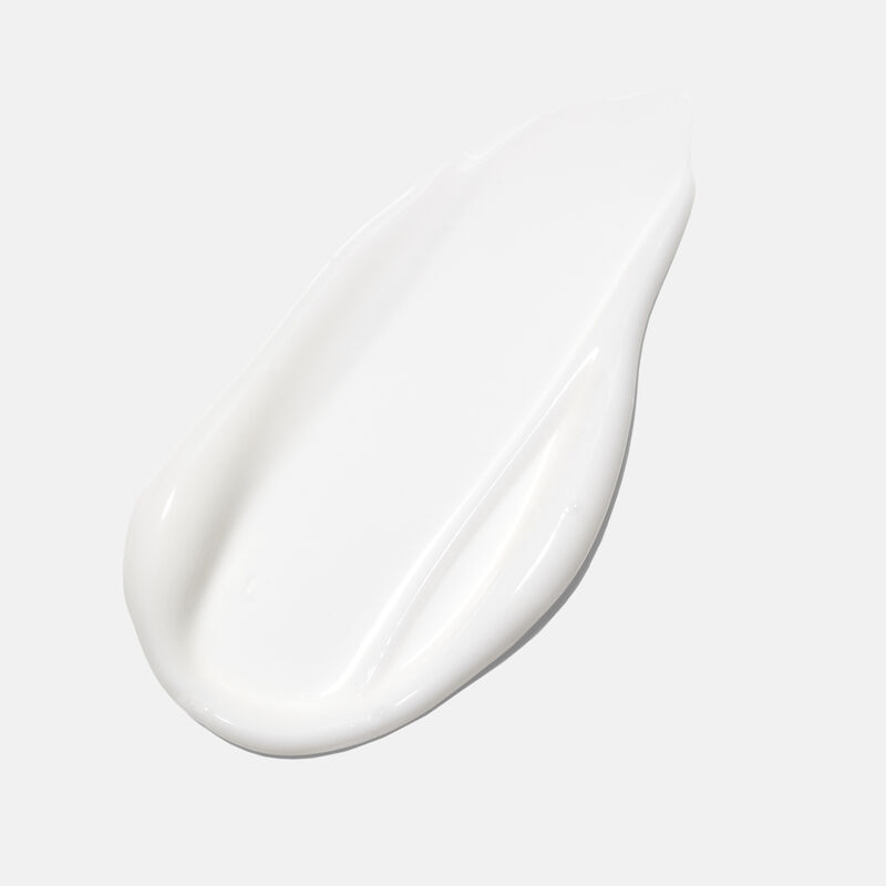 Product rub of the Normal / Dry formula of TimeWise Antioxidant Moisturizer against plain background