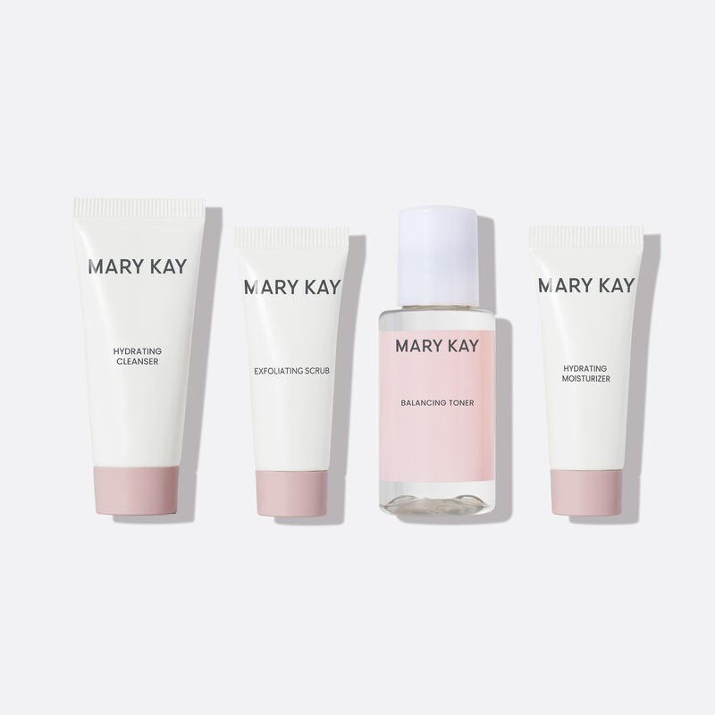 Miniature bottles of Mary Kay Hydrating Regimen on plain background.