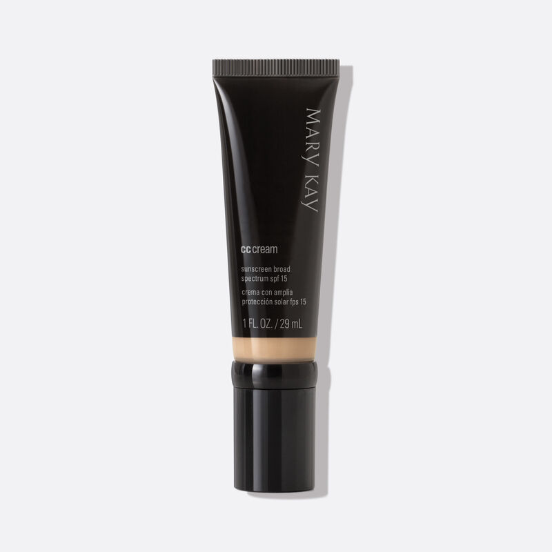 Black tube of Mary Kay CC Cream SPF 15 in shade Medium to Deep on plain background