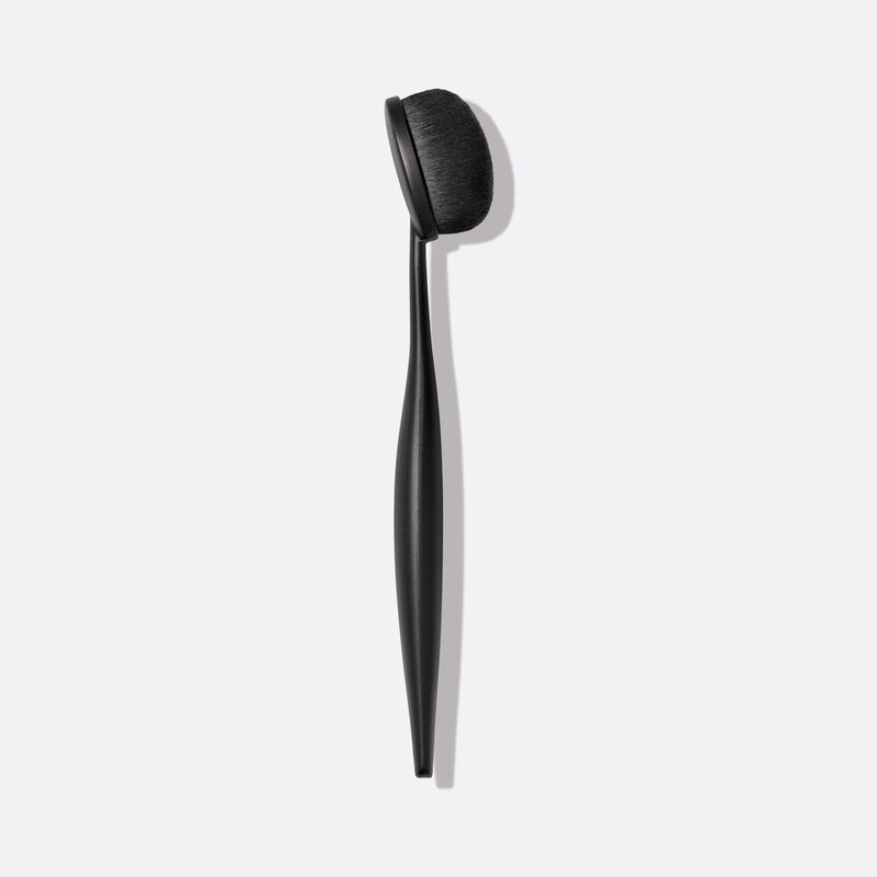 Side view of Mary Kay Blending Brush on plain background