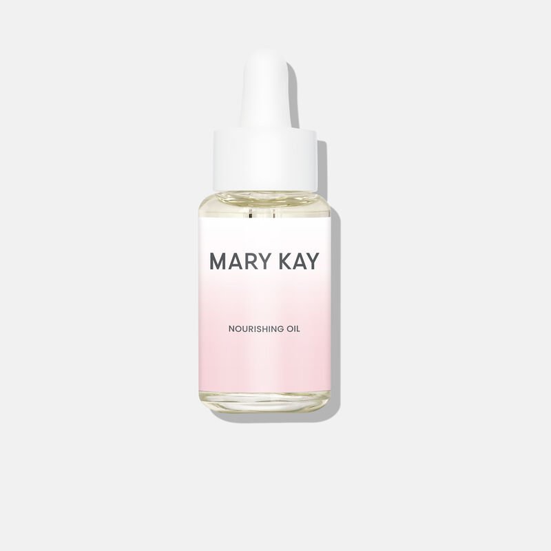 Closed bottle of Mary Kay Nourishing Oil against plain background.