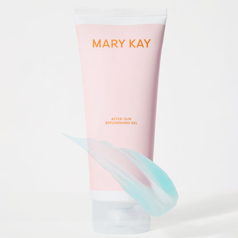 Tube of special-edition Mary Kay After-Sun Replenishing Gel standing on its cap with an overlay of product rub