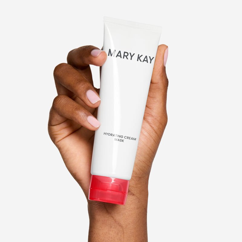 Mary Kay Hydrating Cream Mask held in a deep-skinned woman&rsquo;s hand.