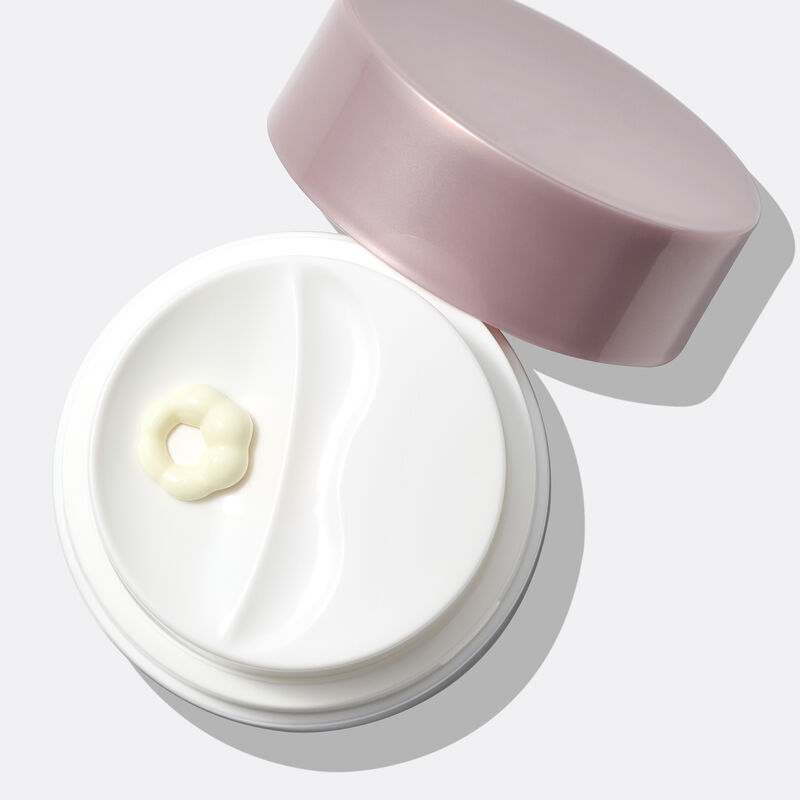 Close-up of Night Treatment with product being dispensed.