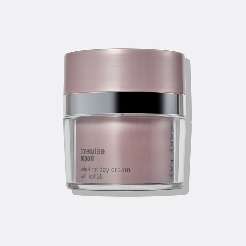 Close-up of Day Cream against plain background.