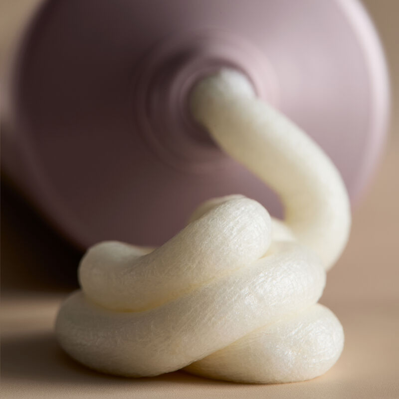 Close-up of cleanser coming out of tube