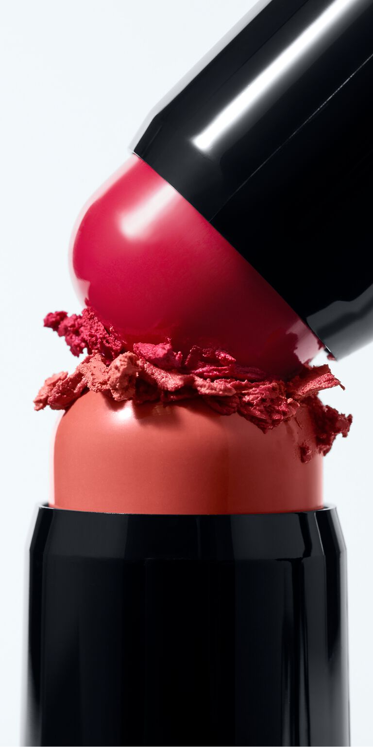 Two limited-edition Mary Kay Blush Sticks pressed together with pigment  between the tips