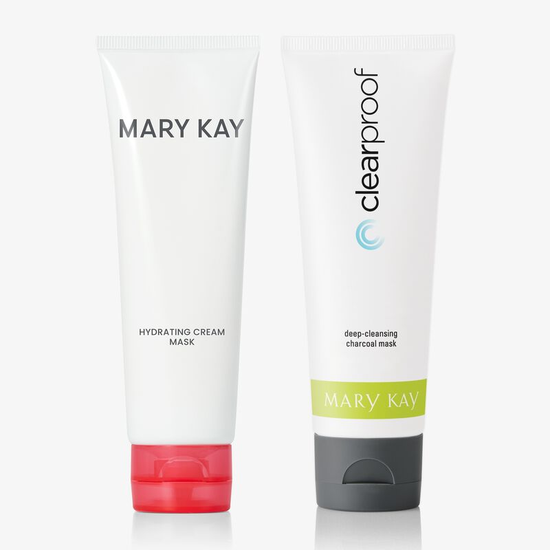 Mary Kay Hydrating Cream Mask and Clinical Solutions Deep-Cleansing Charcoal mask standing upright on their caps