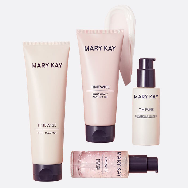 TimeWise Miracle Set products arranged in order of application with one product swipe on plain background